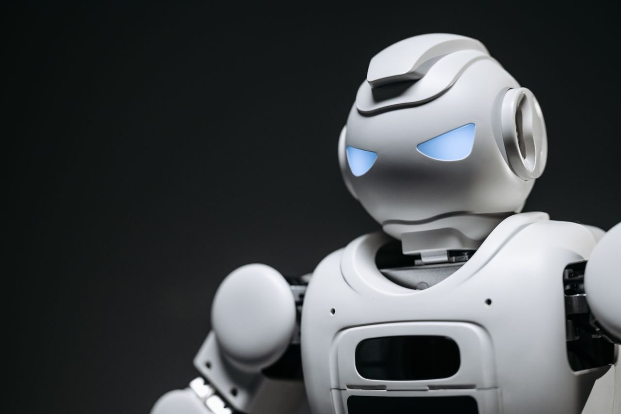 High-tech robot toy with a gray background in studio lighting.